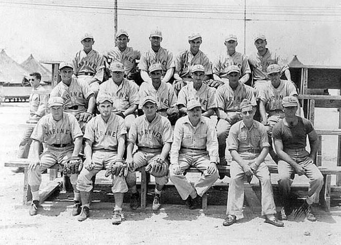 This photo taken in 1945 on Kwajalein Island shows “Nevil’s devils” who were runners-up in the Island championship. The team was coached by. LTCOL Nevils (photographer – Thorpe, Clell – source: VMB613.com).