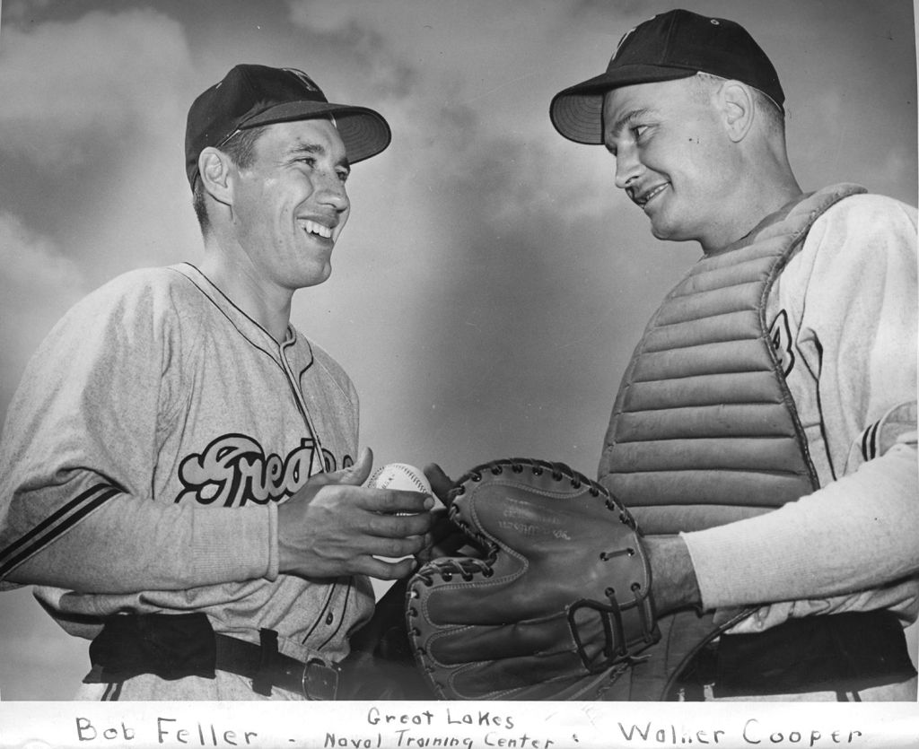 Chief Feller (left) meets with his catcher, Walter Cooper at the Great Lakes Naval Training Center.
